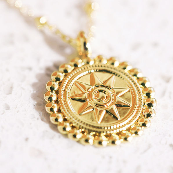 back of monogrammed gold sunshine necklace