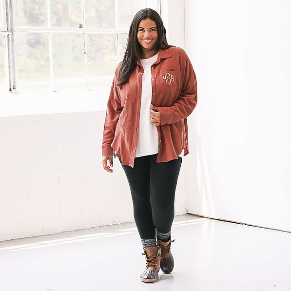 plus model in waffle button down shirt