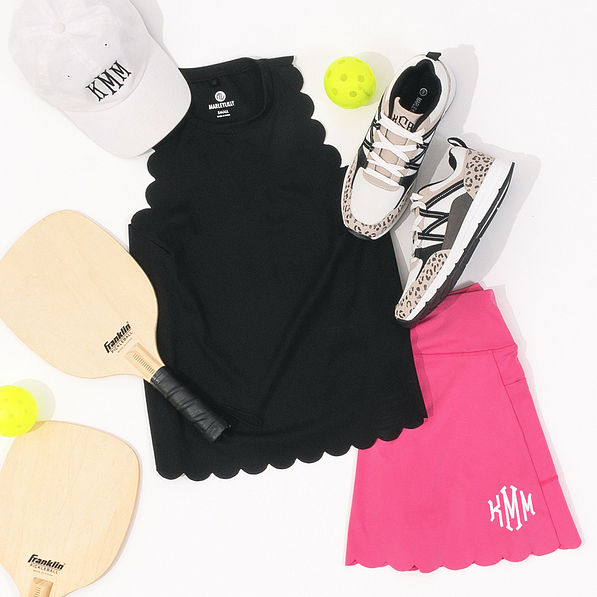 exercise ootd with tank top and monogrammed hot pink skort