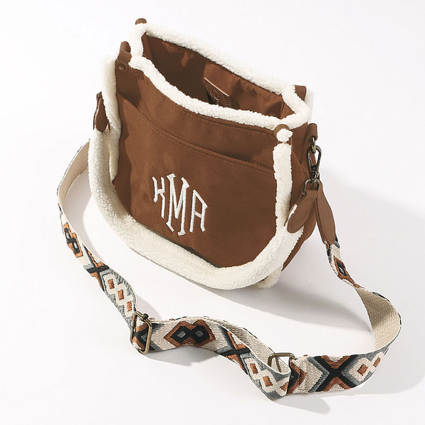 monogrammed suede sherpa crossbody bag