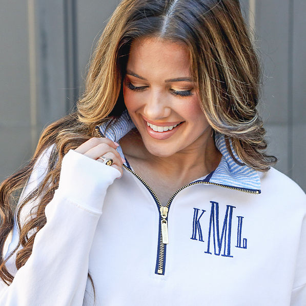 close up of seersucker collar on monogrammed quarter zip sweatshirt