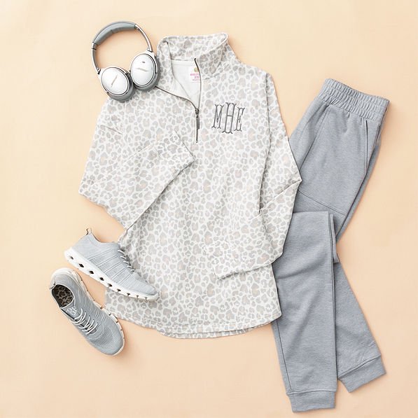 snow leopard quarter zip sweatshirt flatlay