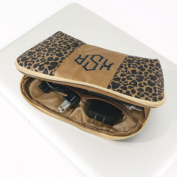 leopard monogrammed tech pouch with with cords inside