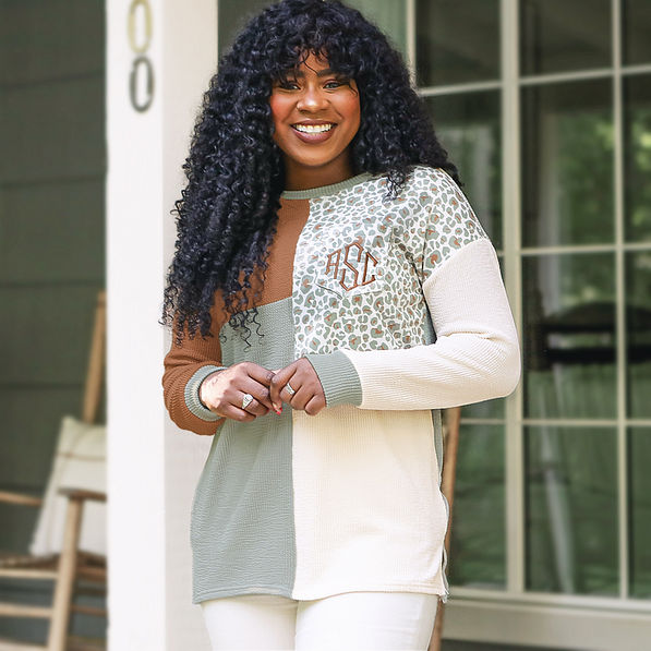 monogrammed leopard patch sweatshirt with white pants