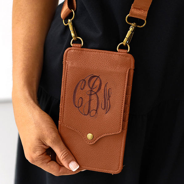 monogrammed phone crossbody in brown close up with chocolate thread