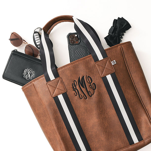 monogrammed purse tote in brown with accessories cropped