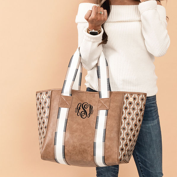 neutral aztec purse tote on arm