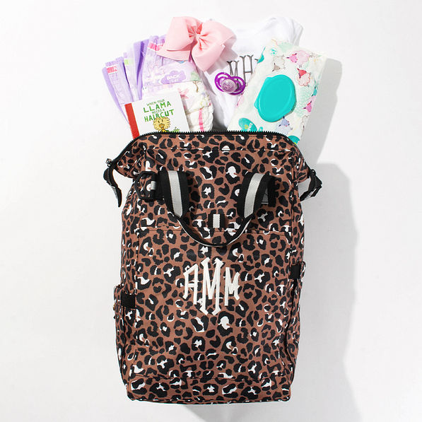 leopard diaper backpack flatlay