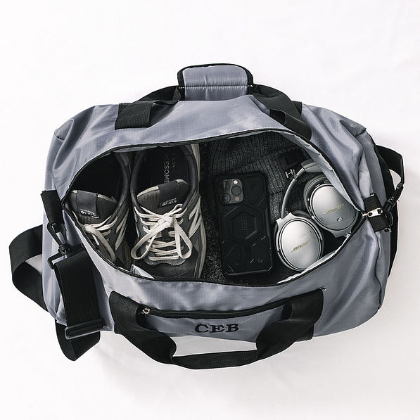 Inside of personalized packable travel bag in charcoal