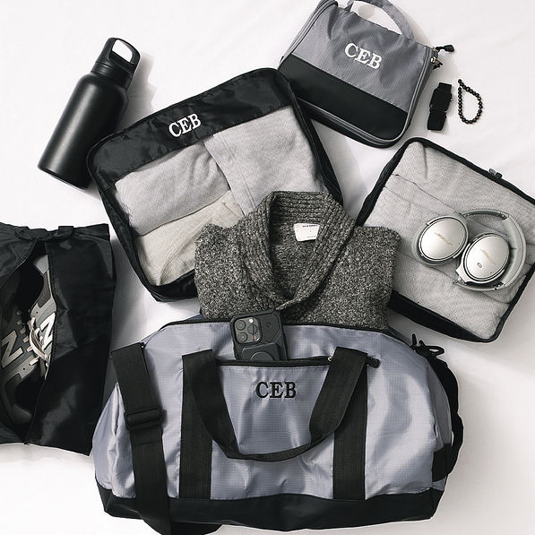 personalized packable travel bag in charcoal and black with packing bag set