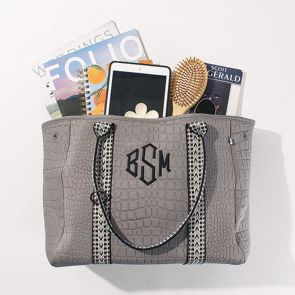 spill shot of taupe textured neoprene tote