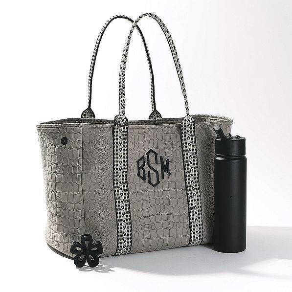 studio shot of taupe textured neoprene tote