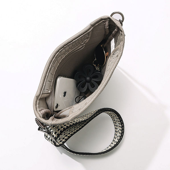 inside of taupe textured neoprene crossbody