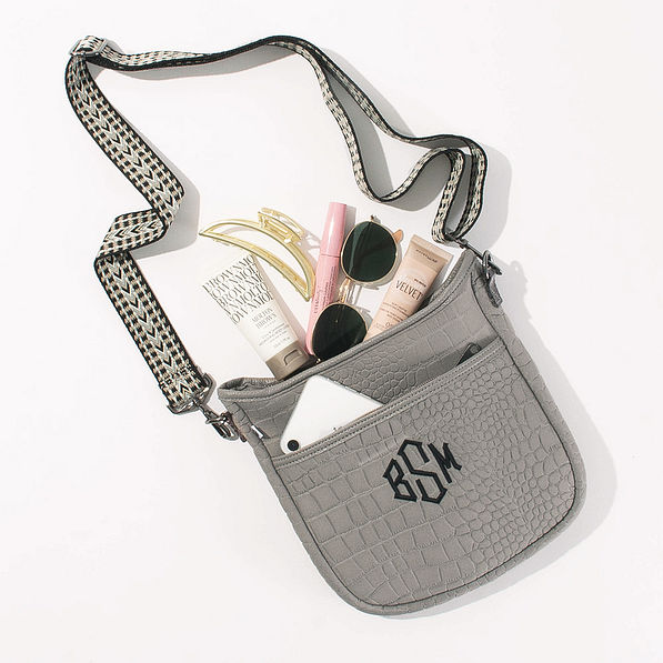 spill shot of taupe textured neoprene crossbody