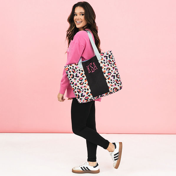 sunset leopard tote bag on shoulder