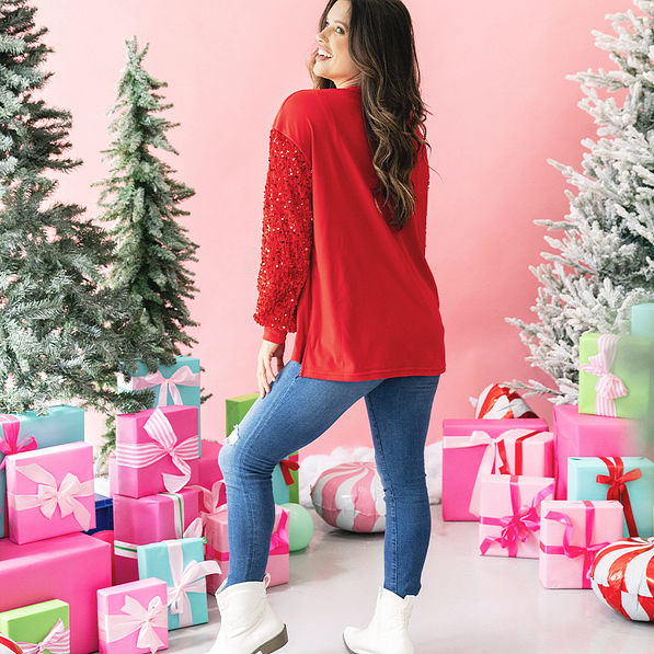 back of red christmas sweatshirt