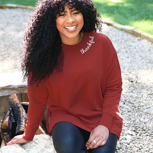 burgundy thankful sweatshirt on mia