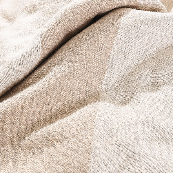 details of monogrammed checkered blanket