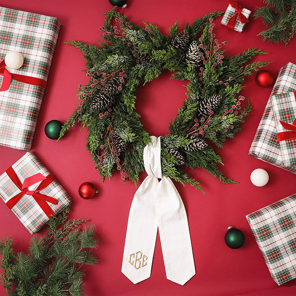 ivory wreath sash on red background