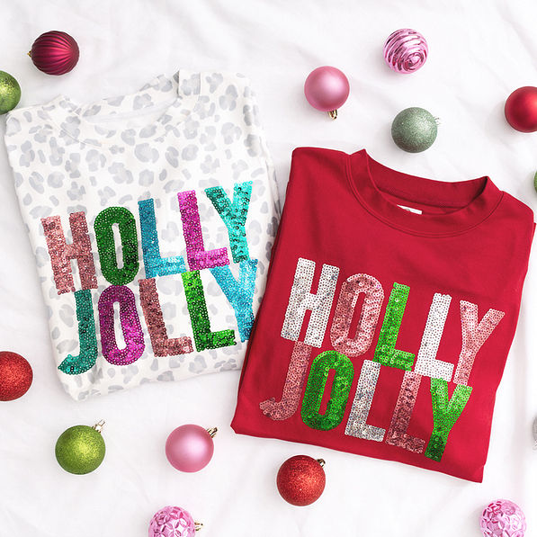close up of white cheetah and crimson holly jolly sweatshirts