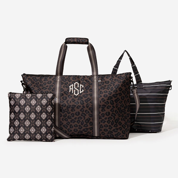 monogrammed travel bag set in sable cheetah