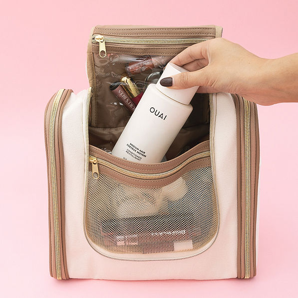 inside of ivory hanging toiletry bag