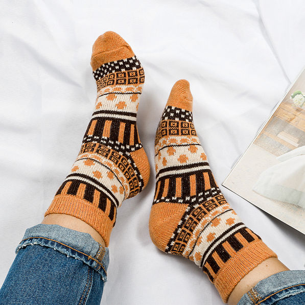 harvest socks on white sheet