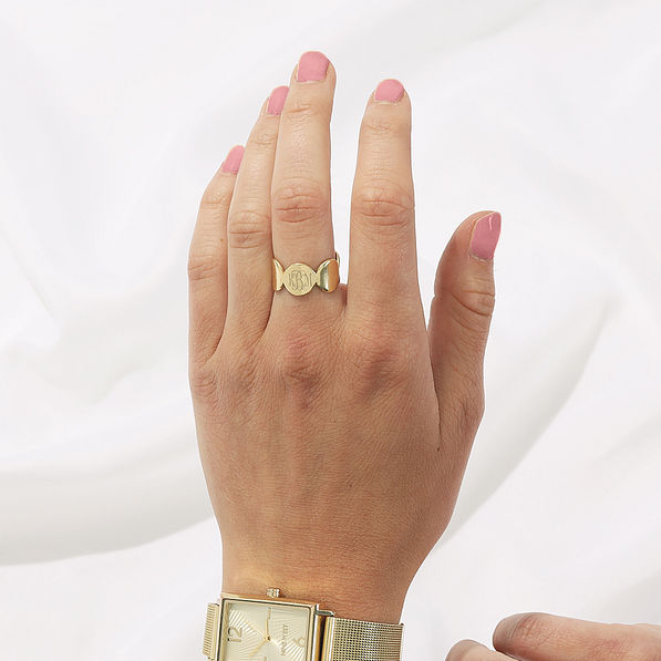 girl wearing gold cuff ring