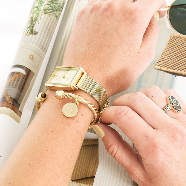 gold cable bracelet on arm