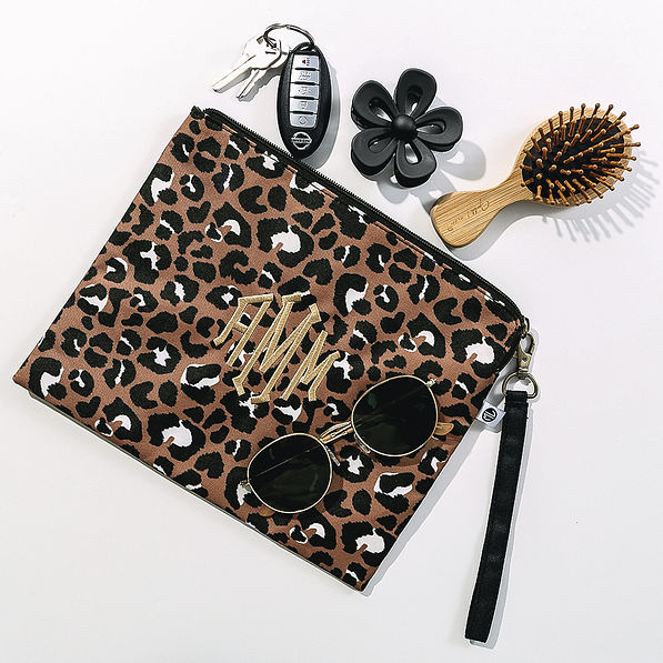 cheetah wristlet and neutral flower claw clip