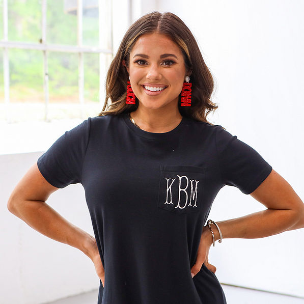 red earrings on ears