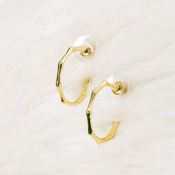 bamboo hoops on white fur