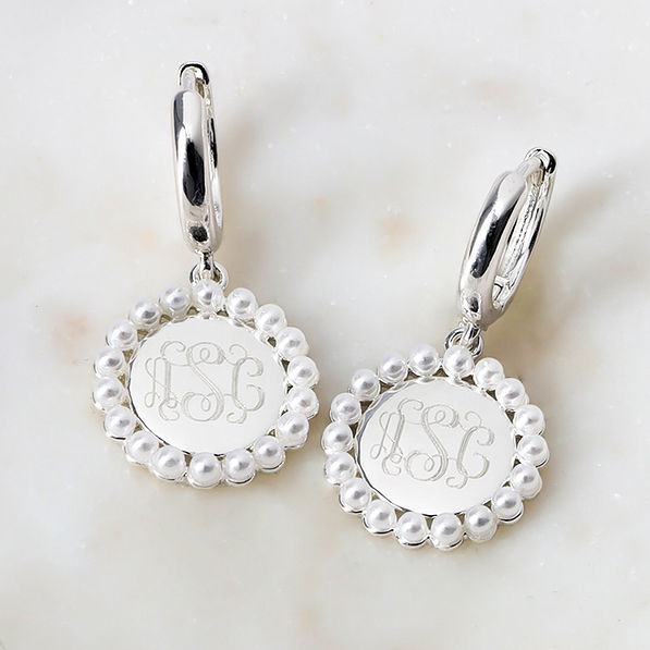Monogrammed Huggie Hoop Earrings in Silver on marble