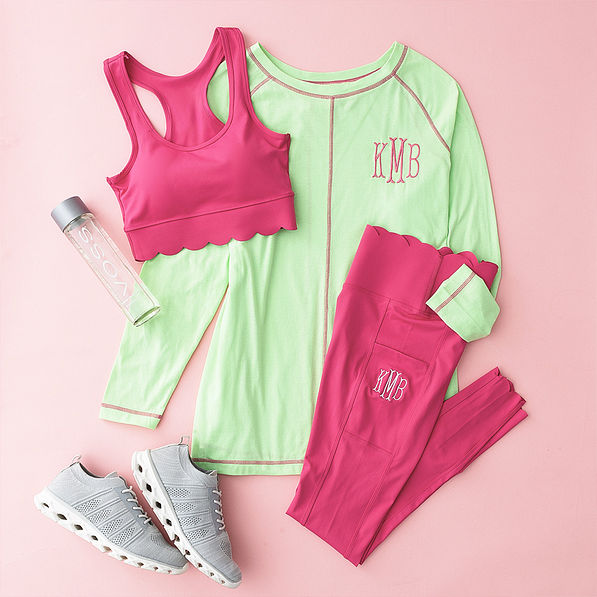 hot pink outfit flatlay with leggings