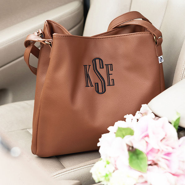 brown hobo purse in car