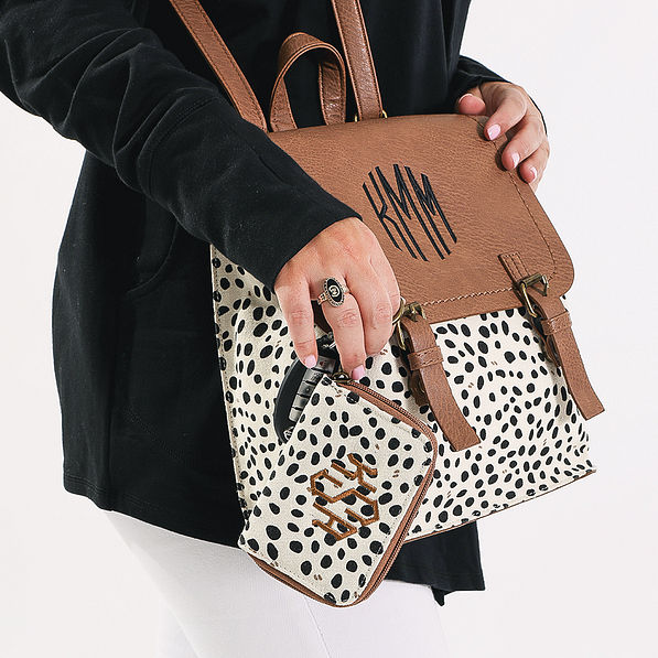 white leopard keychain wallet and backpack purse