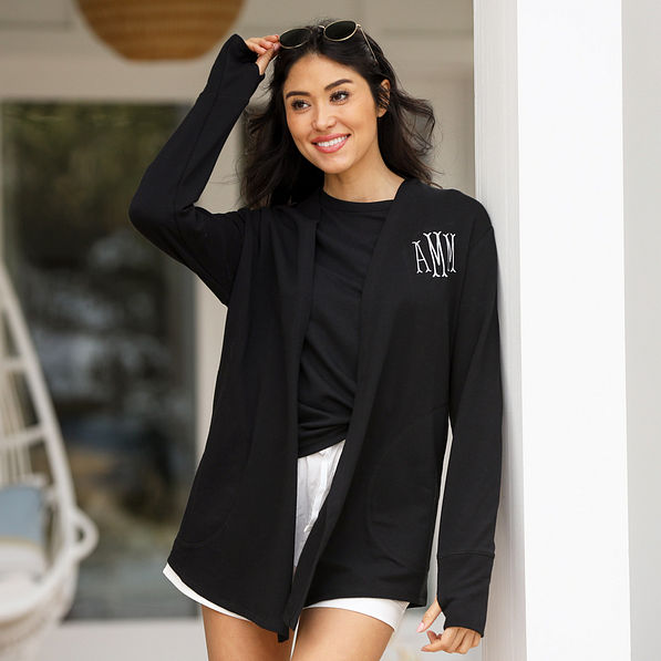 black sweatshirt cardigan at the beach