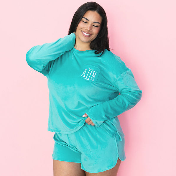 girl wearing teal monogrammed softspun lounge set
