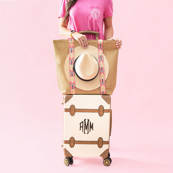 monogrammed pink sun hat carrier with luggage