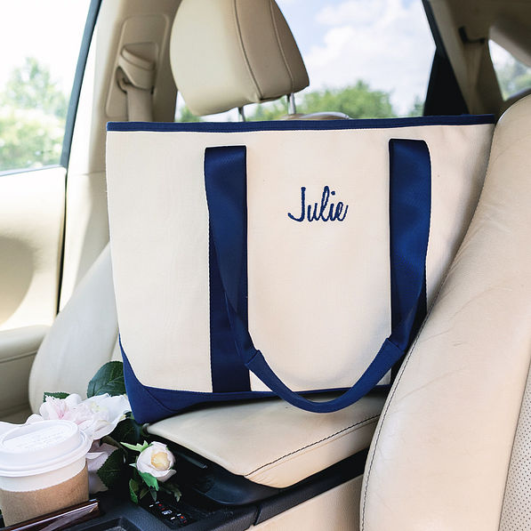 monogrammed navy boat tote bag in car