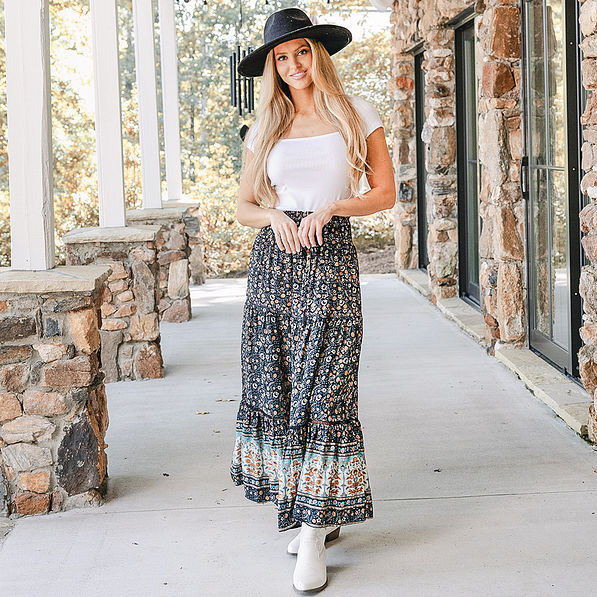 girl wearing midi skirt in black paisley