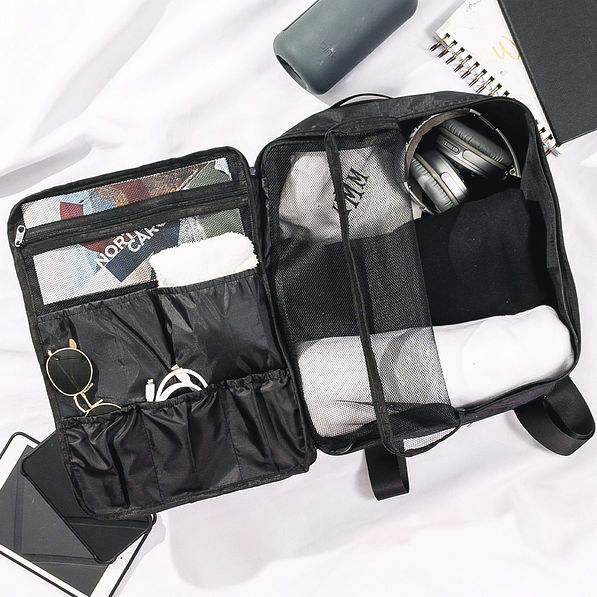 open shot of bag on black packable backpack