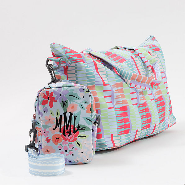 travel crossbody clipped to travel bag