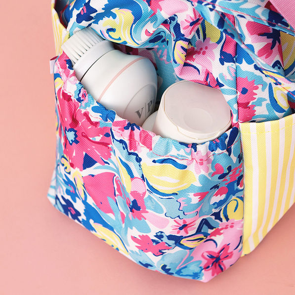 close up of toiletry bag in watercolor whimsy side pocket