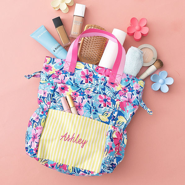 monogrammed toiletry bag in watercolor whimsy packed