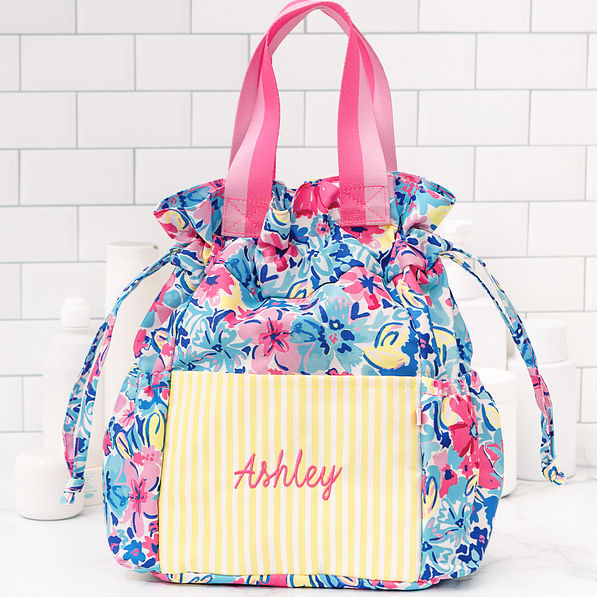 personalized toiletry bag in watercolor whimsy on counter