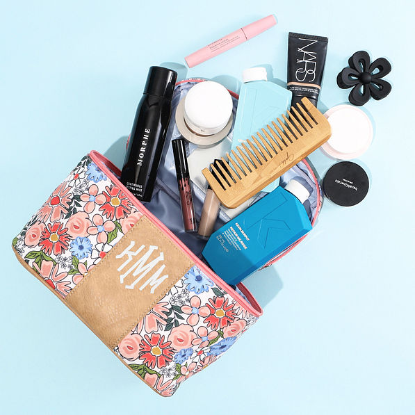 boho blooms train case flatlay with props
