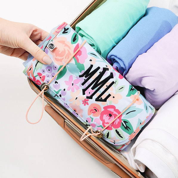 personalized french floral toiletry kit in luggage
