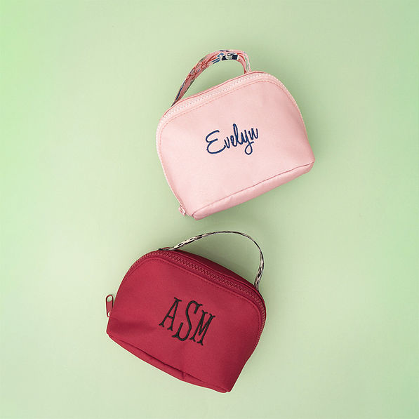 duo makeup bags in autumn whimsy and maroon