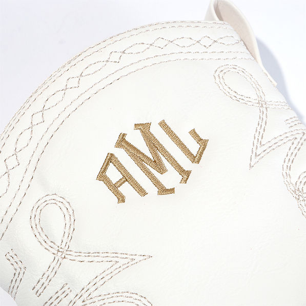 close up of monogrammed cowboy boots